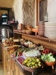 Avlu Cave House - servizio colazione