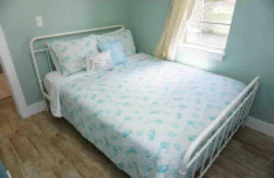 Tropical Oasis Steps to the Beach - Charming Hideaway with Fenced Yard