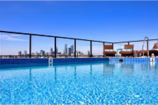 Rooftop Pool and Chic Amenities - Stylish Urban Sanctuary
