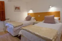 Two bedroom apartment situated in the countryside parish of St Pierre du Bois Hotels in 