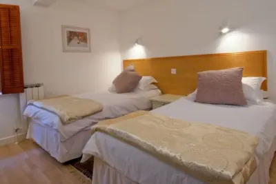 Two bedroom apartment situated in the countryside parish of St Pierre du Bois Hotels in 