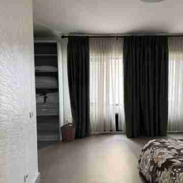 Beautifully furnished 3 bedroom apartment with spacious living area. WiFi & DSTV Rooms