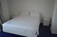 Seafront Juniper apartment with large veranda, 20m from the crystal clear sea.