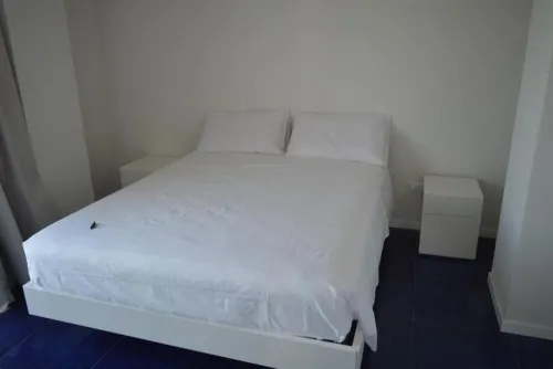 Seafront Juniper apartment with large veranda, 20m from the crystal clear sea.