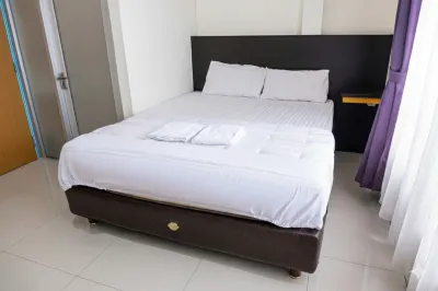 HOTEL SIMPANG SINGKAWANG Отели в г. 