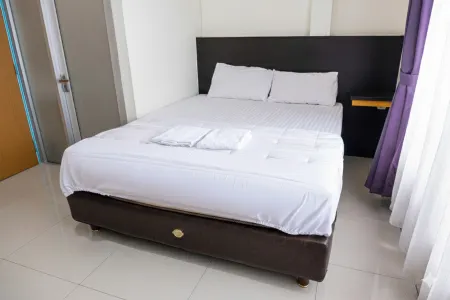 HOTEL SIMPANG SINGKAWANG Отели рядом с достопримечательностью «Mess Pemda»