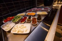 Holiday Inn AKTAU - SEASIDE by IHG - servizio colazione