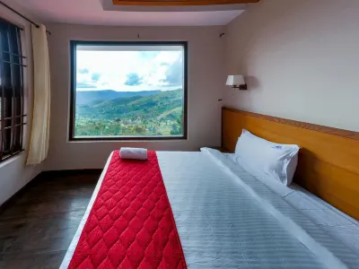 Warmth Hill Crest Hotels near Poombarai village