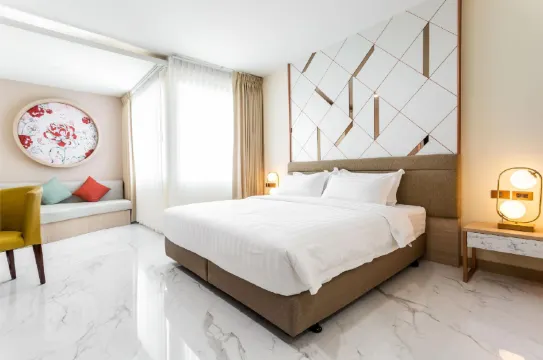 ห้องดีลักซ์ เตียงใหญ่ 1 เตียง