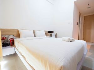 Cozy Studio Tree Park Apartment Near Ice BSD City by Travelio