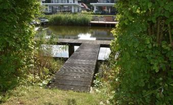 Holiday Home in Zeewolde with Jetty Next to Golf Course