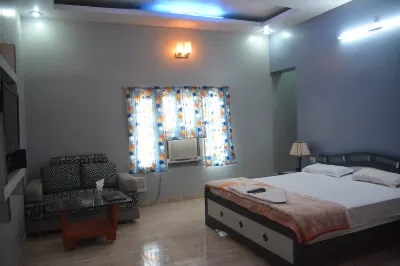 Hotel Naveen Residency Hotels near Botanical Garden of C M Science College