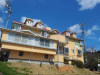 Pension Vingt-Quatre Yeux Hotels near Shōdo Island