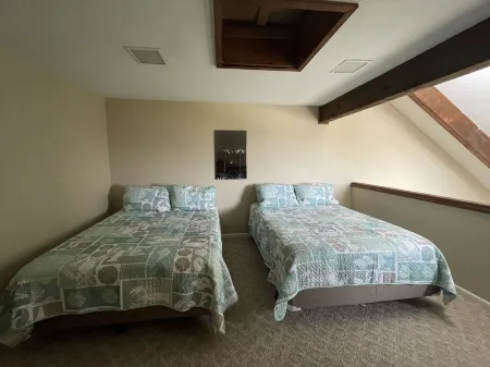 Beach Retreat Minutes to the Beach and just steps to the Pool!!