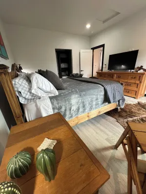 King bed and sunset views pine trees and hiking trails await you! Pinetreepalace Hotels near Upper Goldwater Lake parking
