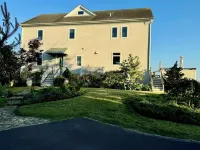 Steps to beach! Custom-built house with panoramic ocean views, wrap-around deck. Hotels near Bishop's Orchards Farm Market & Winery