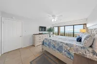 Walls of windows overlooking the blue ocean!