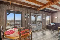 Peaceful cabin with a lovely view of the TN river---the PERFECT weekend getaway! Hotels in Humphreys County