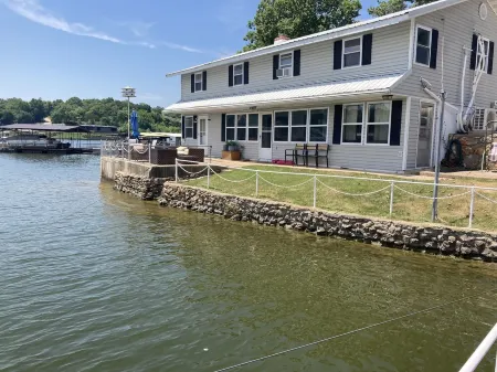 Lake front with view, dock and calm water