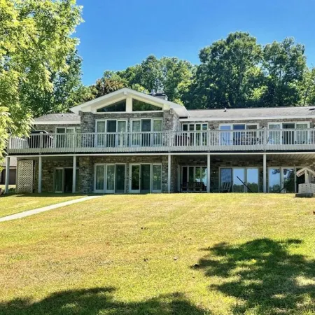 Spacious Lake house with Double Boat Dock & Gently Sloping Lot