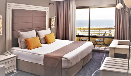 Suhan Seaport Hotel Отели в г. Bayraklidede Mahallesi