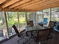 Parkmodel cabin w screened porch in campground on bike trail.