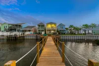 Bayfront Home with Shared Pool, Dock, Balcony, Playground and Washer/Dryer