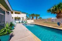 Coastal-themed home near the ocean with pool, AC & fast WiFi Hotels near Sea Turtle, Inc.