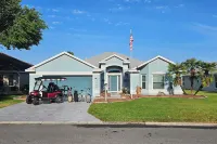 Premier home with Heated Pool, Waterfront, 2 king beds & 4 person golf cart.