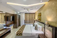 Essentia Manipal Inn Hotels near Sri Chamundeshwari Ammanavara Devasthana, Karamballi
