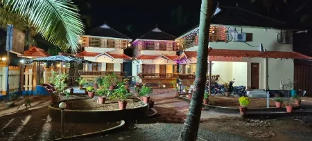 Lake Tree Homes and Resorts Отели в г. Кумараком