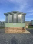 Immaculate 2-Bed Static Caravan at Monrieth Hotels near Cairn Holy Chambered Cairn