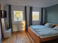 Vacation home Windschief directly behind the dike with large garden, WLAN, fireplace Hotels in Wurster Nordseekuste