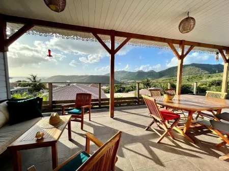 New villa with swimming pool, magnificent view of the caribbean sea, 1 'from the beach Отели в г. Лез Анс-д'Арле