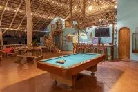 Private beach house paradise w/ private pool bar and game area.