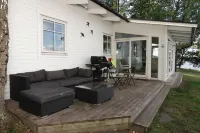 House with hot tub on the beach near Stockholm Hotels in Boo