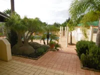 Bungalow with apartment in a quiet location and large pool