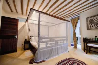 Relax and rejuvenate in South Coast of Kenya: Beach front property sleeps 6 , Hotel a Msambweni