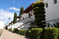 Hotel Cuamanco Отели в г. 