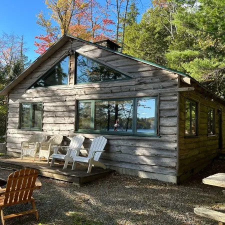 Welcoming 4-bedroom lake front cabin in charming Otis on Beech Hill Pond.