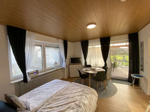 Garden apartment B with private terrace in Tossens