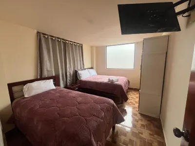 Amplio apartamento familiar en el centro de Baños incluye garaje. Hotels in
