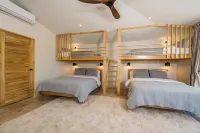 Super lux 5-bedroom, 7 bath house in beautiful Playa Grande with golf cart!