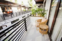 Holiday Suites Port Barton فنادق في سان فيسنتي
