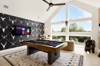 Modern Luxe South Lamar Retreat with Heated Pool, Game Room, and Outdoor Theater