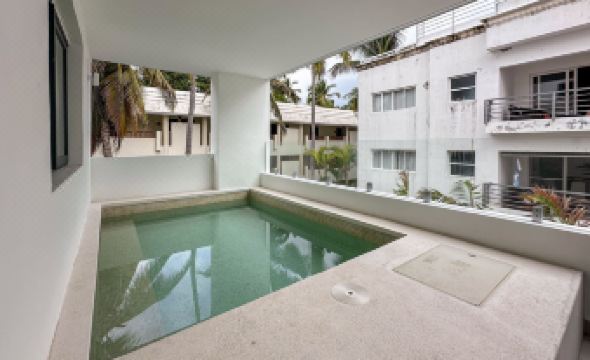 Incredibly Beautiful Condo Just Steps to the Beach