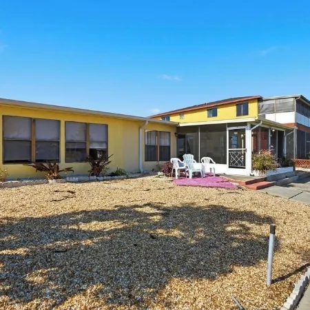 4 bedrooms home located on the deep water canal 13630 Garris Dr. Hudson Fl 34667