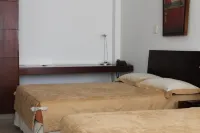 호텔 쿠아르타 아베니다  호텔