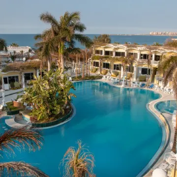 Paradise Inn Beach Resort Отели рядом с достопримечательностью «Пляж Мамура»