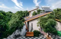 Freesia Resort by Express Inn Hotels near KWP